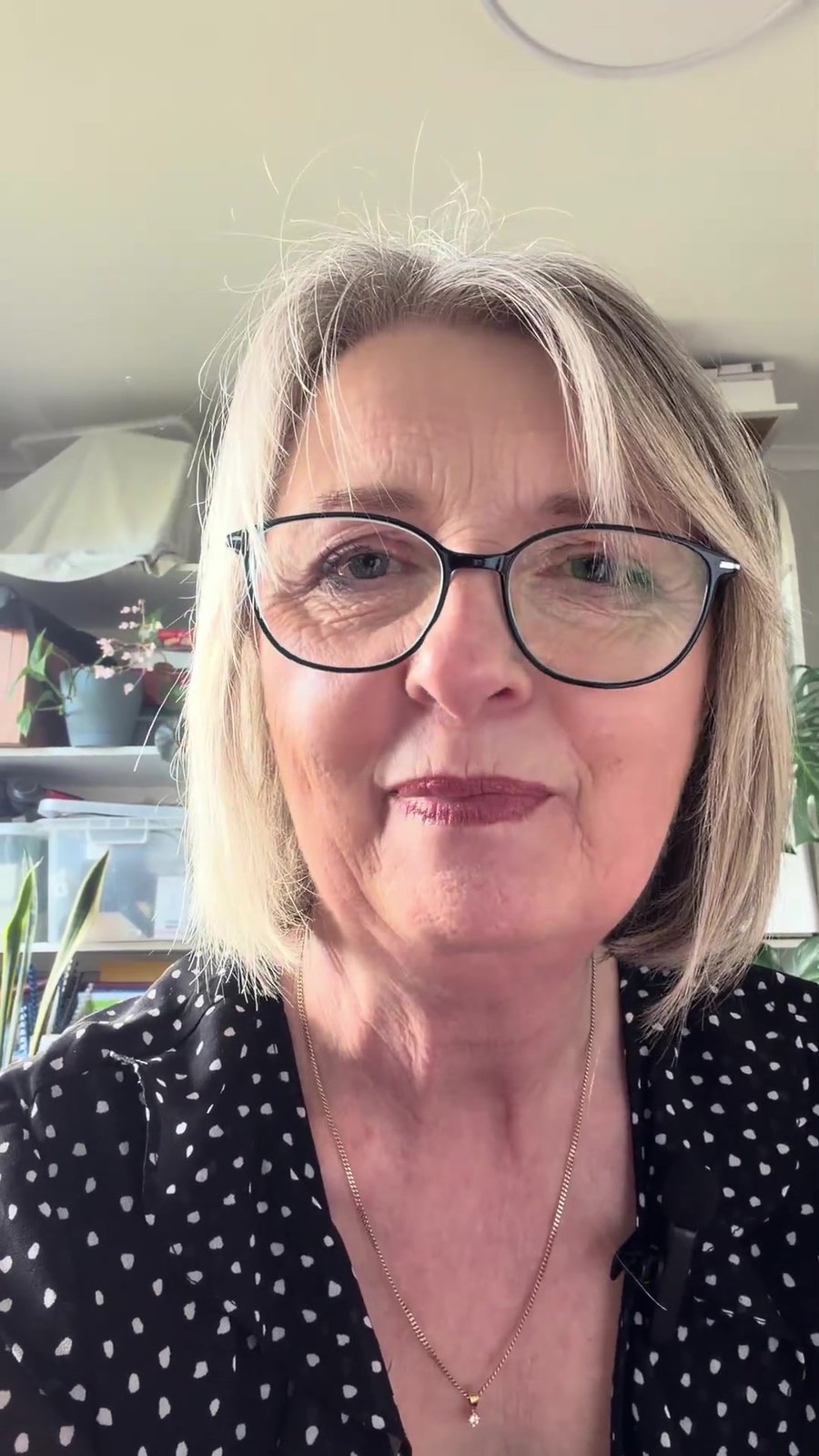Mary Figg smiling at the camera while recording her introduction video