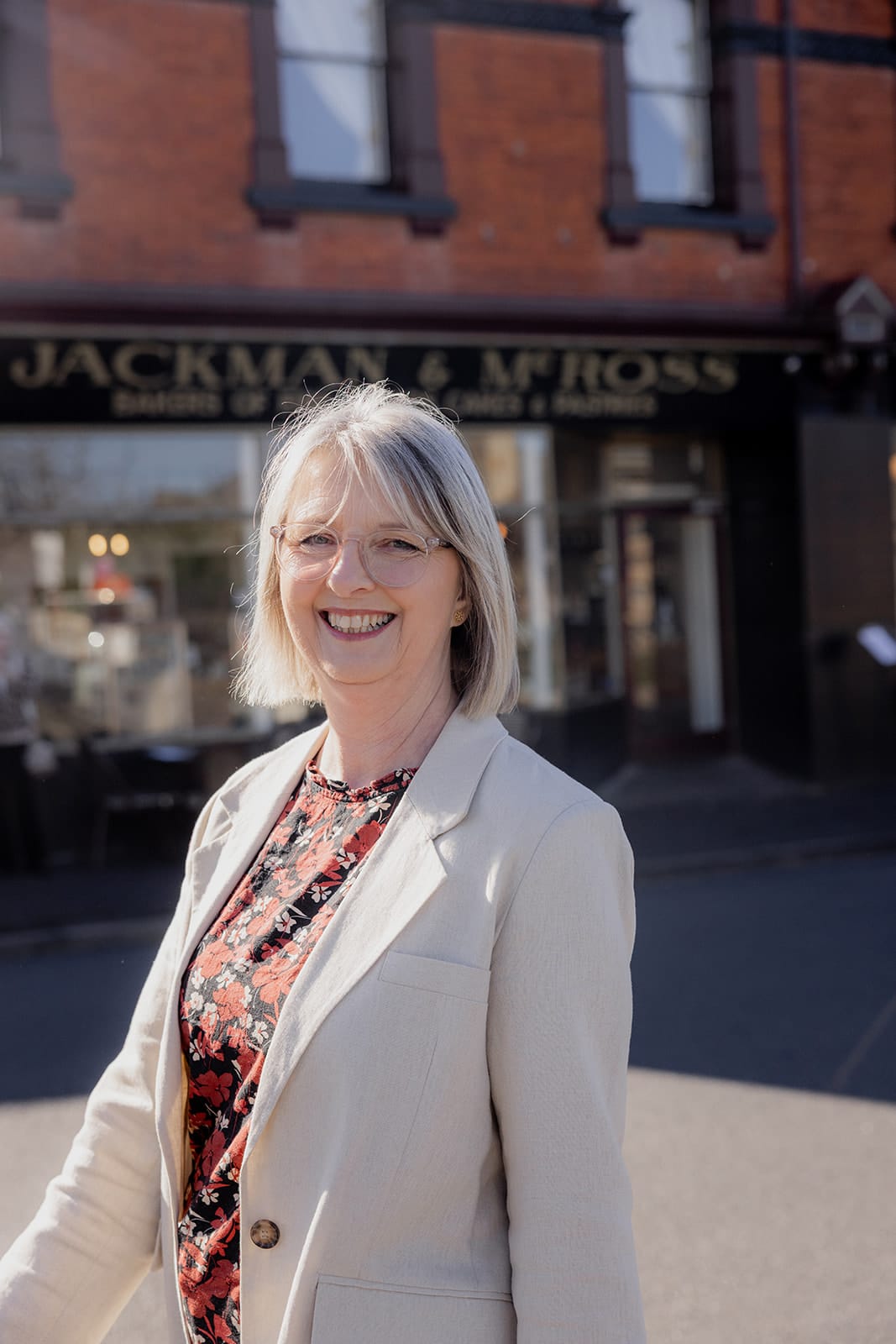 Mary Figg smiling warmly on a Hobart street